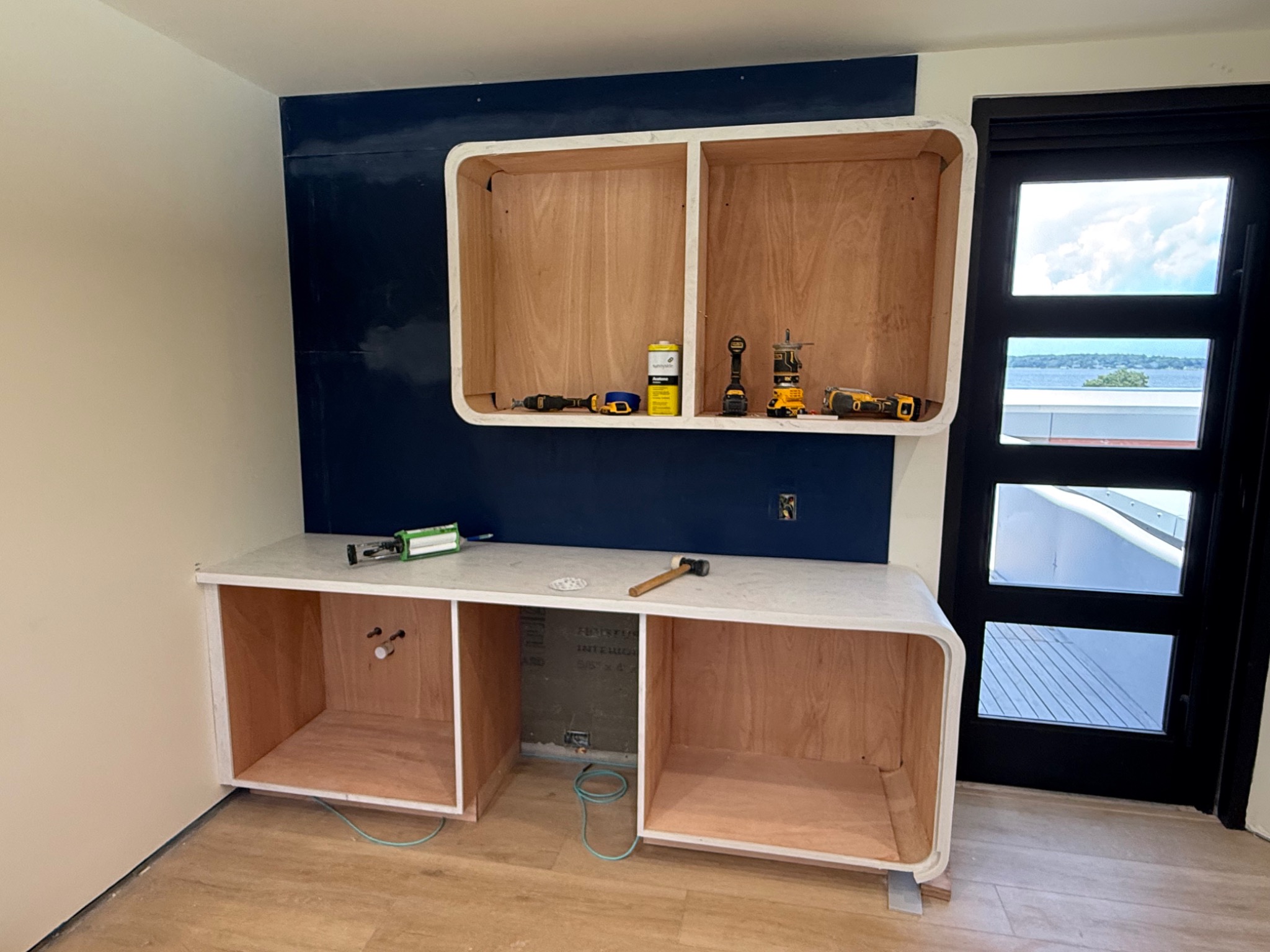 Curved custom bar cabinetry at Kohala Ranch